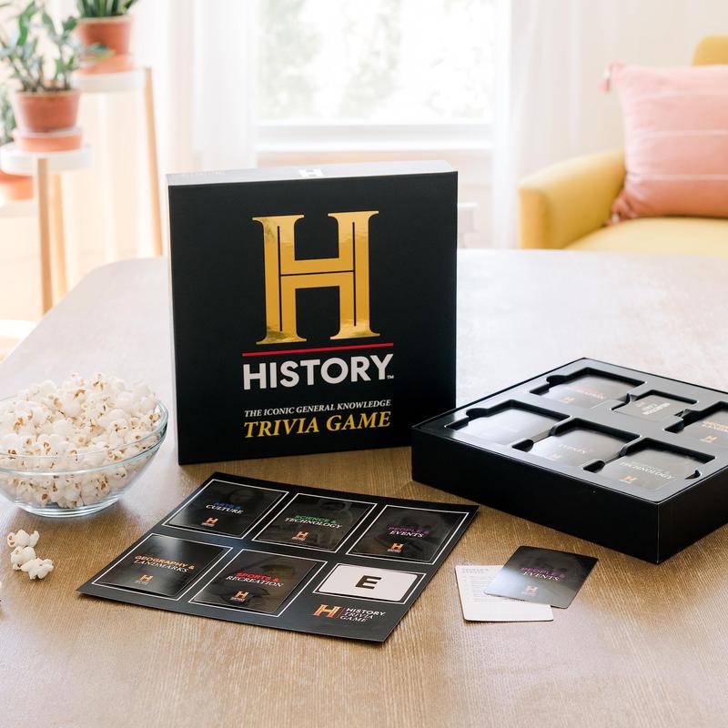 HISTORY Channel Trivia Board Game Deluxe Edition with 80s & 90s Expansion Pack - 2400+ General Knowledge Questions. Fun Party Card Game for Adults, Family & Teens in The Pursuit of Trivial Knowledge